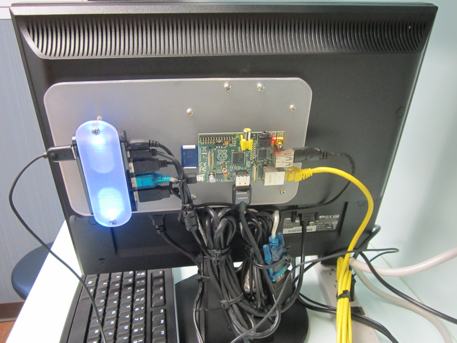 Raspberry PI attached to the back of a Monitor with RFID